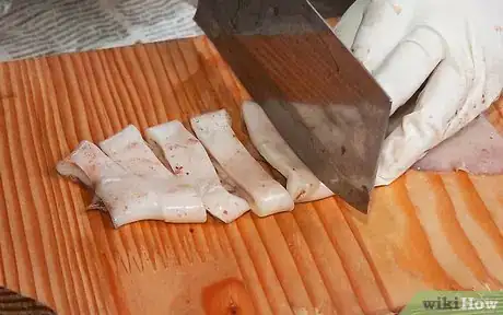 Image titled Clean and Prepare a Squid to Make Calamari Step 7