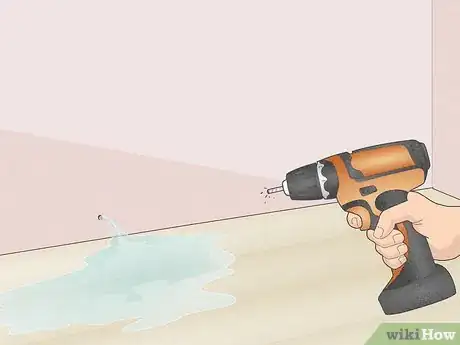 Image titled Dry Damp Walls Step 2