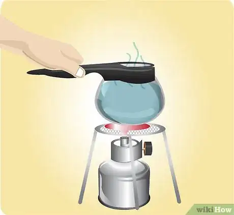 Image titled Continue to hold the coffeepot over the burner until the water just begins to simmer Step 11