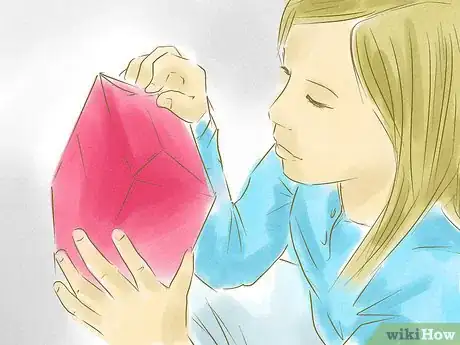 Image titled Open Your Christmas Presents Early Step 3