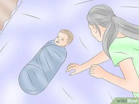 Image titled Transition from Swaddling Step 2