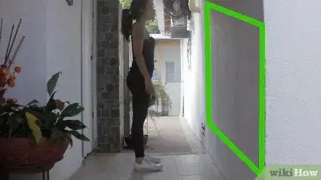 Image titled Do a Wall Push Up Step 1