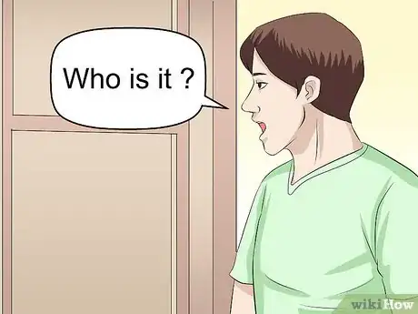 Image titled Answer the Door Safely Step 4