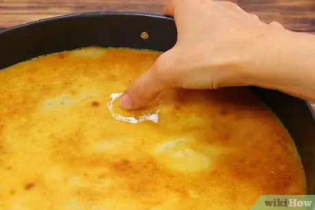Image titled Bake a Ring Into a Cake or Other Food Step 15