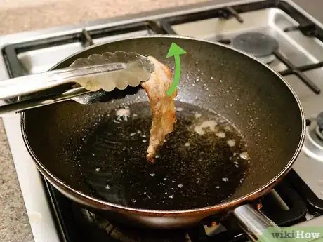 Image titled Deep Fry Bacon Step 5