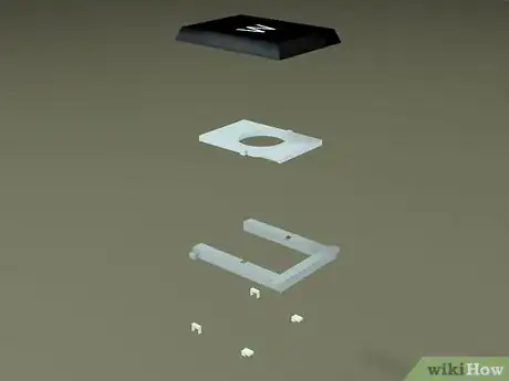 Image titled Pop a Key Back Onto a Dell Laptop Keyboard Step 1