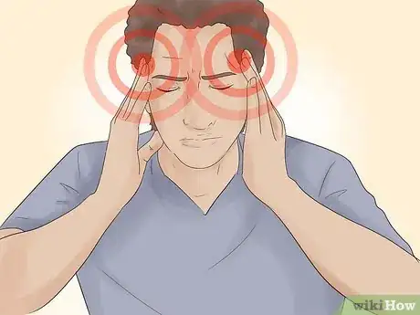 Image titled Get Through a Migraine Step 1