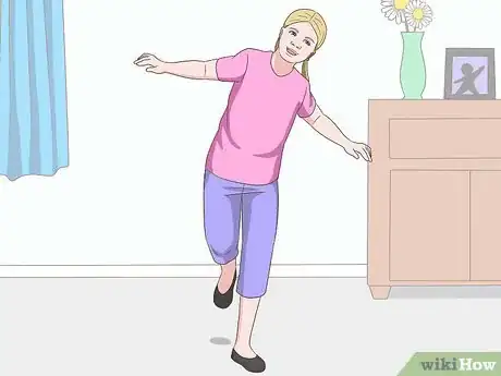 Image titled Remove Water from Ears Step 6