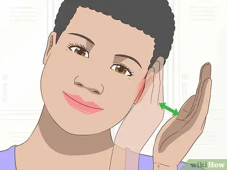 Image titled Remove Water from Ears Step 2