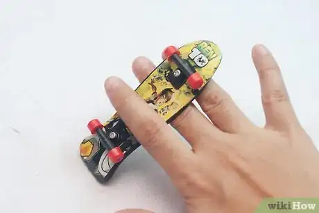 Image titled Do a Truckstand on a Tech Deck Step 1