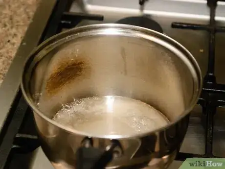 Image titled Make Spun Sugar Cobwebs Step 7