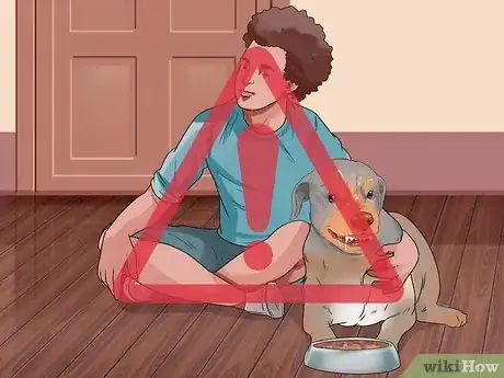 Image titled Tell if a Dog Is Getting Food Aggression Step 8