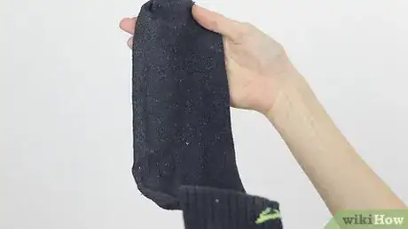 Image titled Do a Sock Bun with Long Hair Step 1