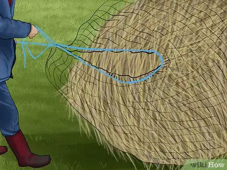 Image titled Cut and Gather String or Net Wrap Off of Round Bales Step 2