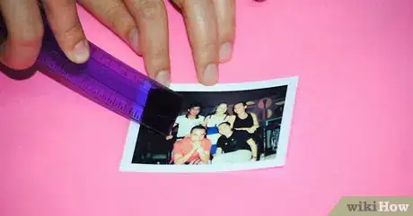 Image titled Rub the tape down Step 2