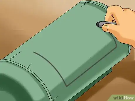 Image titled Make a Wood Burning Heater from an Air Compressor Tank Step 4