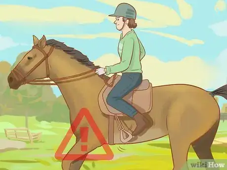 Image titled Not Fall Off a Horse Step 7