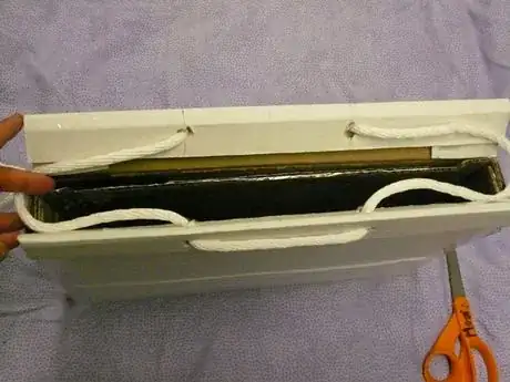 Image titled Make a loop of rope only slightly larger than the case is "around".