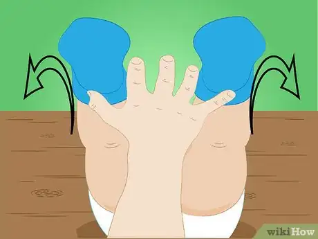 Image titled Use the Ankle‐Hold Technique to Lift the Child's Legs During a Diaper Change Step 6