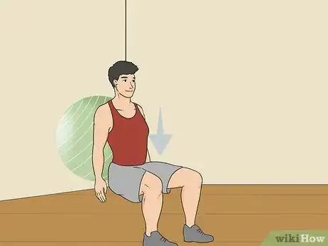 Image titled Do an Exercise Ball Squat Step 3.jpeg