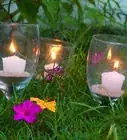 Reuse Broken Stemware As Garden Candle Holders