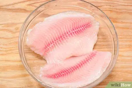 Image titled Fold and Bake Fish in Parchment Paper Step 1
