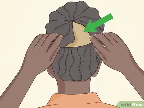 Image titled Put African American Hair in a Bun Step 14