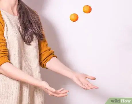 Image titled Teach Juggling Step 8