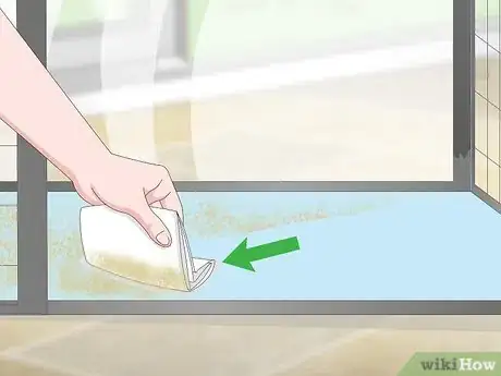 Image titled Clean a Pet Cage with a Fleece Bottom Step 6