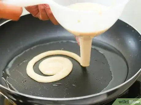 Image titled Make a Funnel Cake Step 7