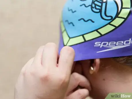 Image titled Put on a Swim Cap Step 5