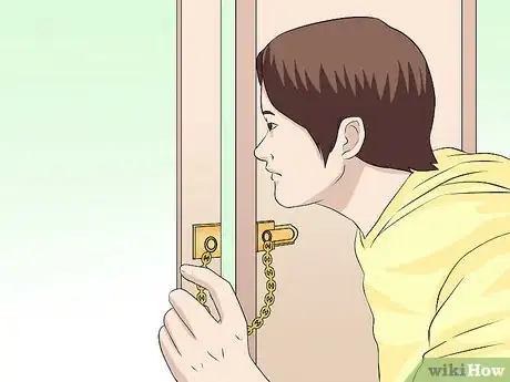 Image titled Answer the Door Safely Step 7