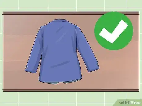 Image titled Pack a Suit Into a Suitcase Step 1