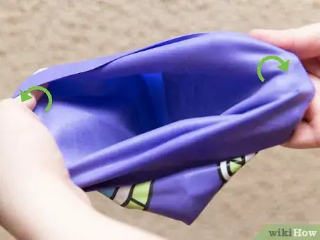 Image titled Put on a Swim Cap Step 3