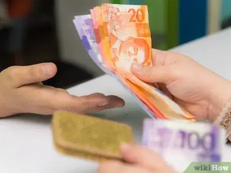 Image titled Fold Money for a Money Clip Step 9