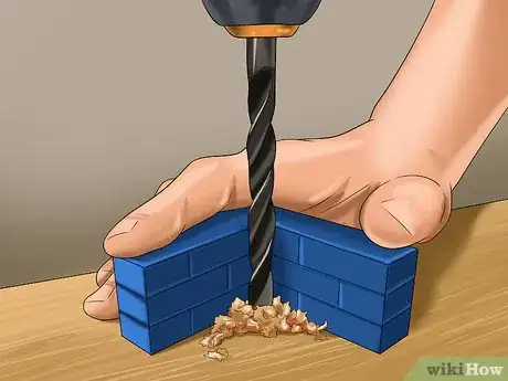 Image titled Drill a Hole on Curved Surfaces Step 6