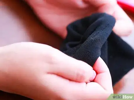 Image titled Get Wavy Hair Overnight with a Bun Step 2