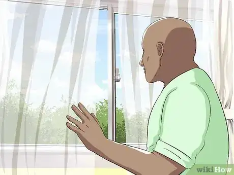 Image titled Answer the Door Safely Step 3