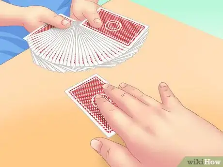 Image titled Make a Card Fall Through a Table Step 12