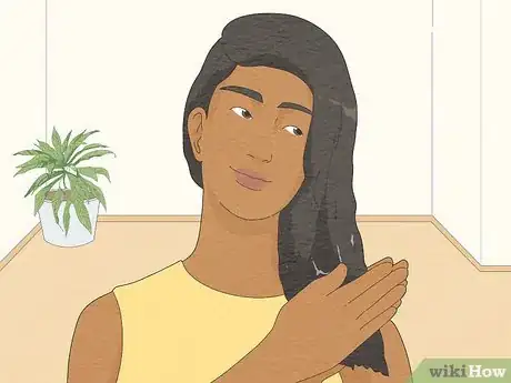 Image titled Curl Black Hair with a Curling Iron Step 4