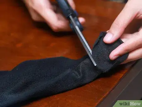 Image titled Get Wavy Hair Overnight with a Bun Step 1