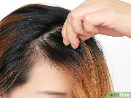 Image titled Make a Side Fringe Without Cutting Your Hair Step 4