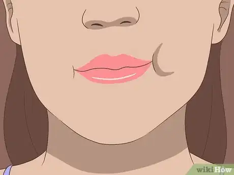 Image titled Remove Water from Ears Step 8