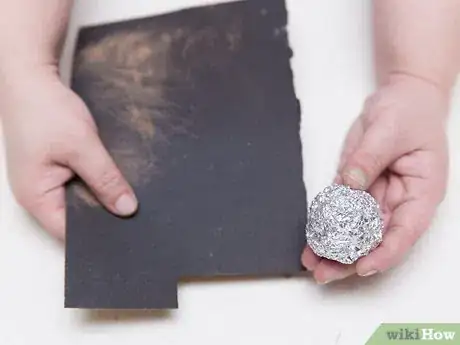 Image titled Clean Rust and Stains from a Tin Step 1