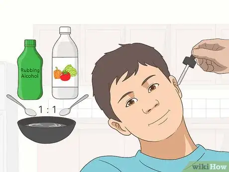 Image titled Remove Water from Ears Step 1