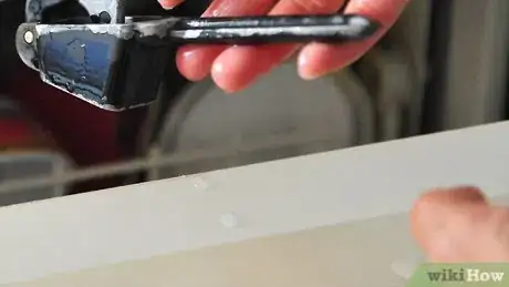 Image titled Easily Clean a Garlic Press Step 9