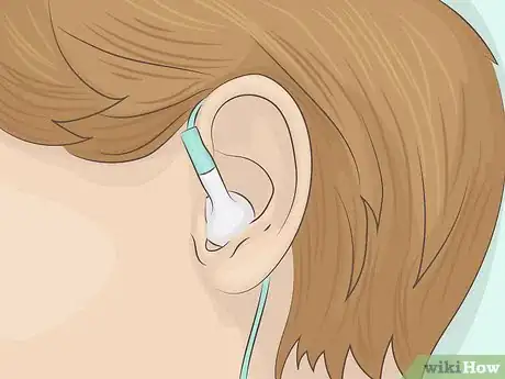 Image titled Keep Earbuds from Falling Out of Your Ears Step 1