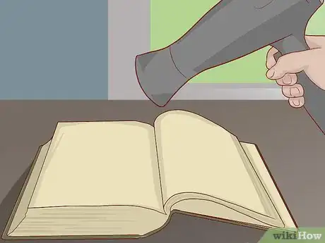 Image titled Remove the Mildew Smell from Books Step 2