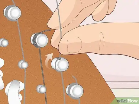 Image titled Change a Harp String Step 9