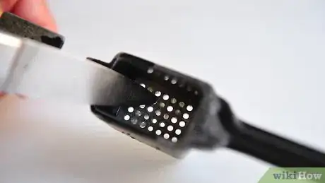 Image titled Easily Clean a Garlic Press Step 6